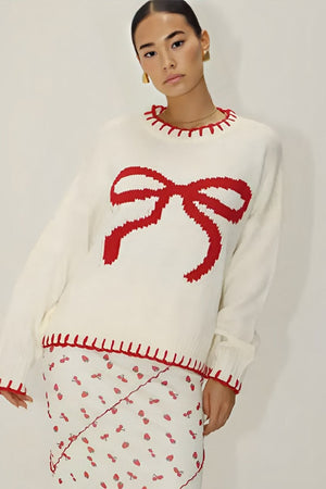 Verspielter Strick: Top mit roter Schleife