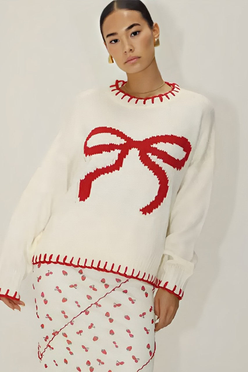 Verspielter Strick: Top mit roter Schleife
