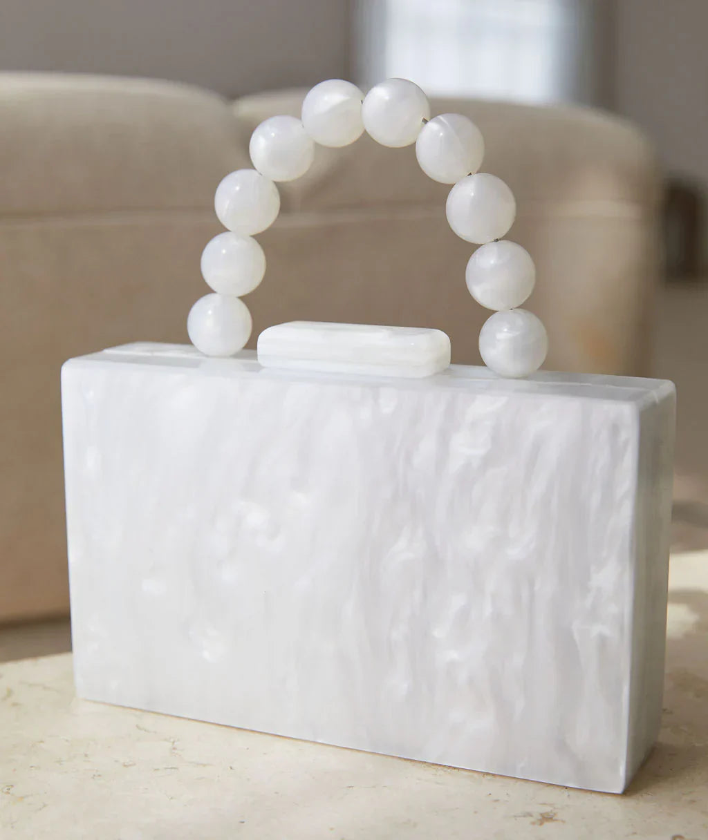 Elegante Clutch mit Perlen-Henkel