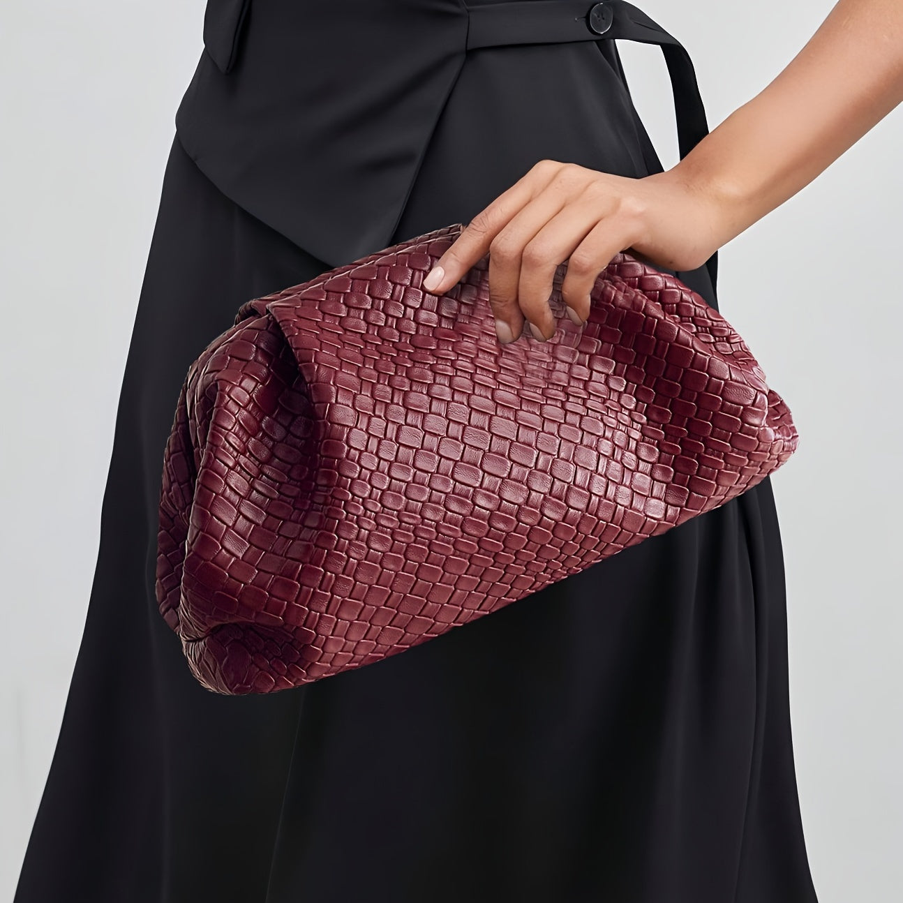 Elegante Clutch mit gewebter Textur