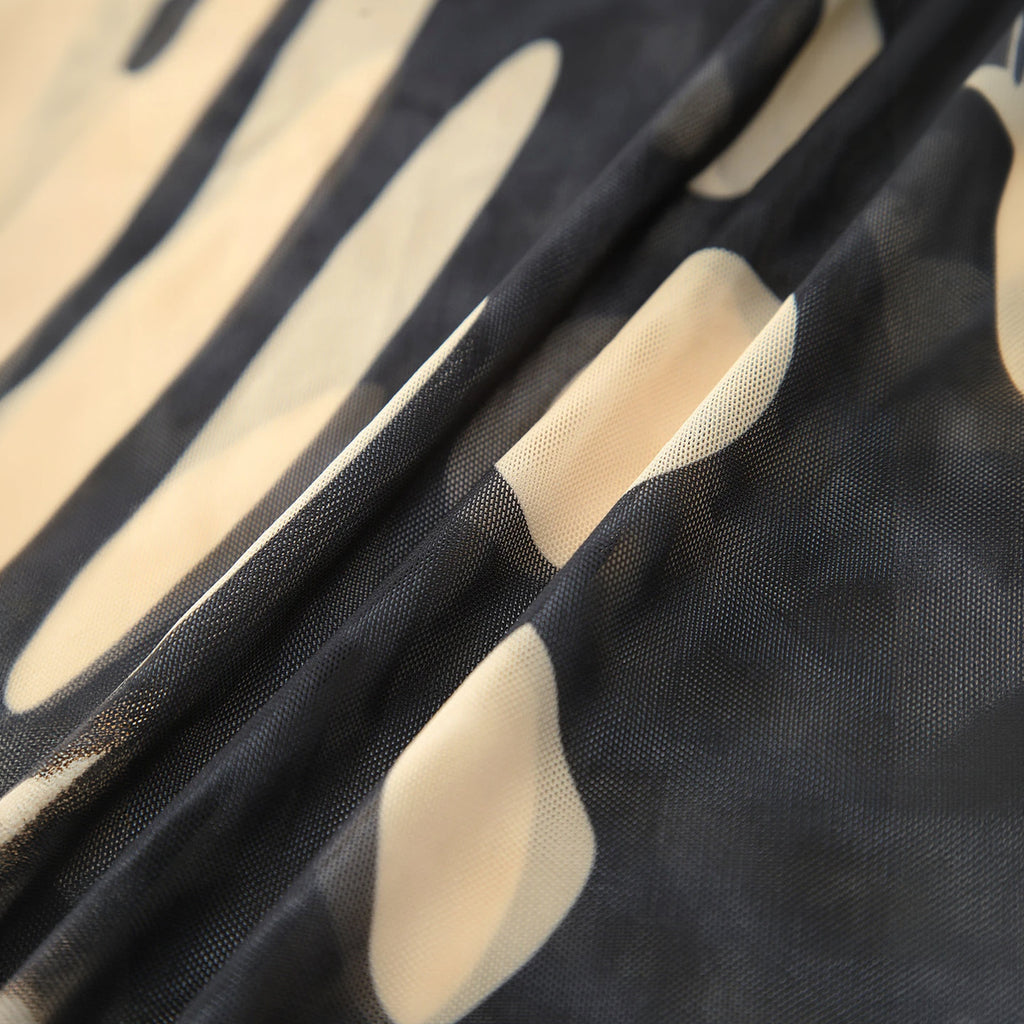 Maxikleid mit abstraktem Print und Schlüsselloch