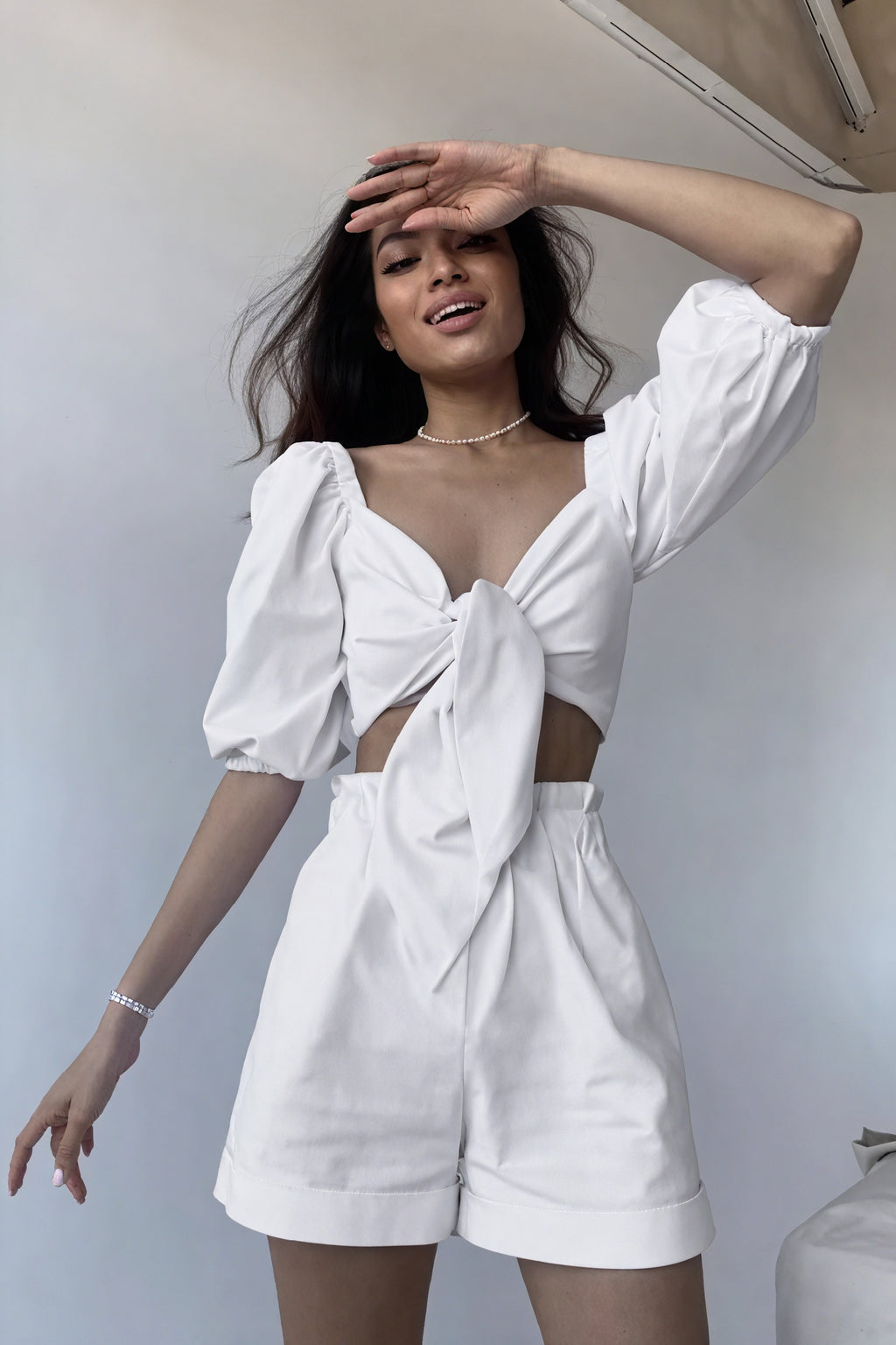 Tailliertes Top mit Puffärmeln