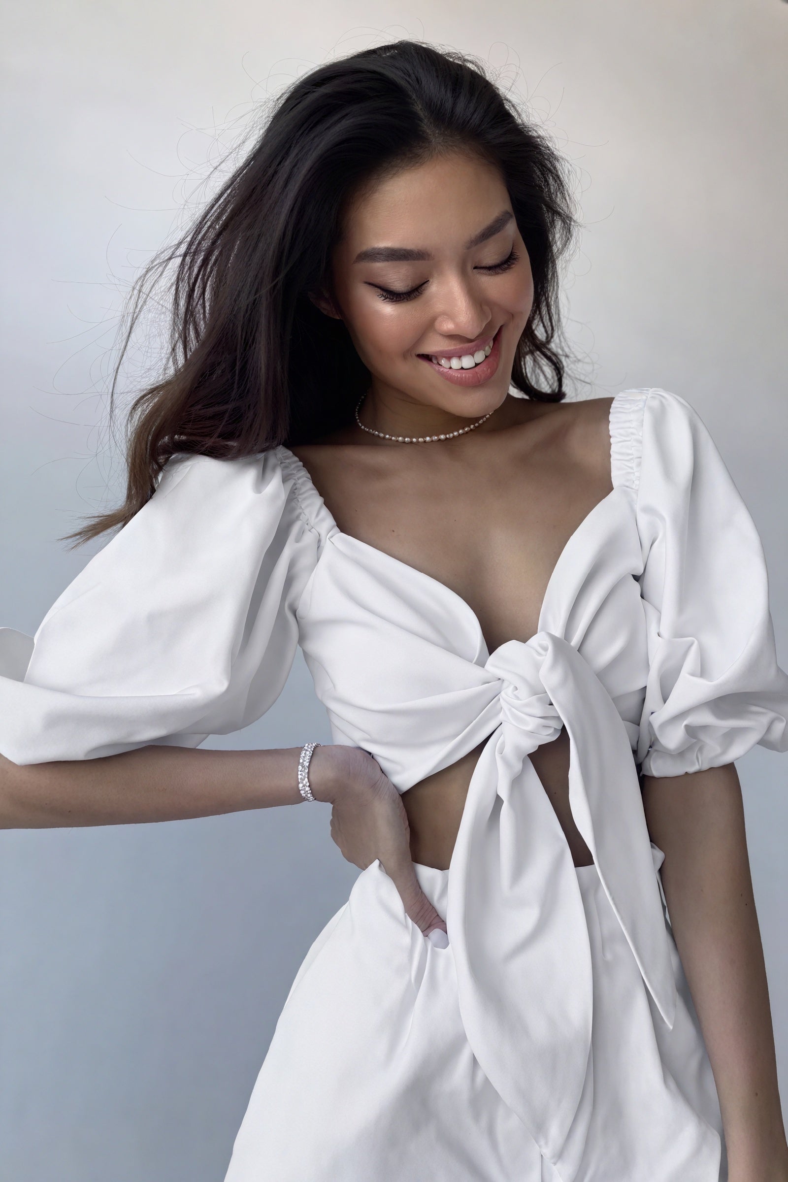 Tailliertes Top mit Puffärmeln