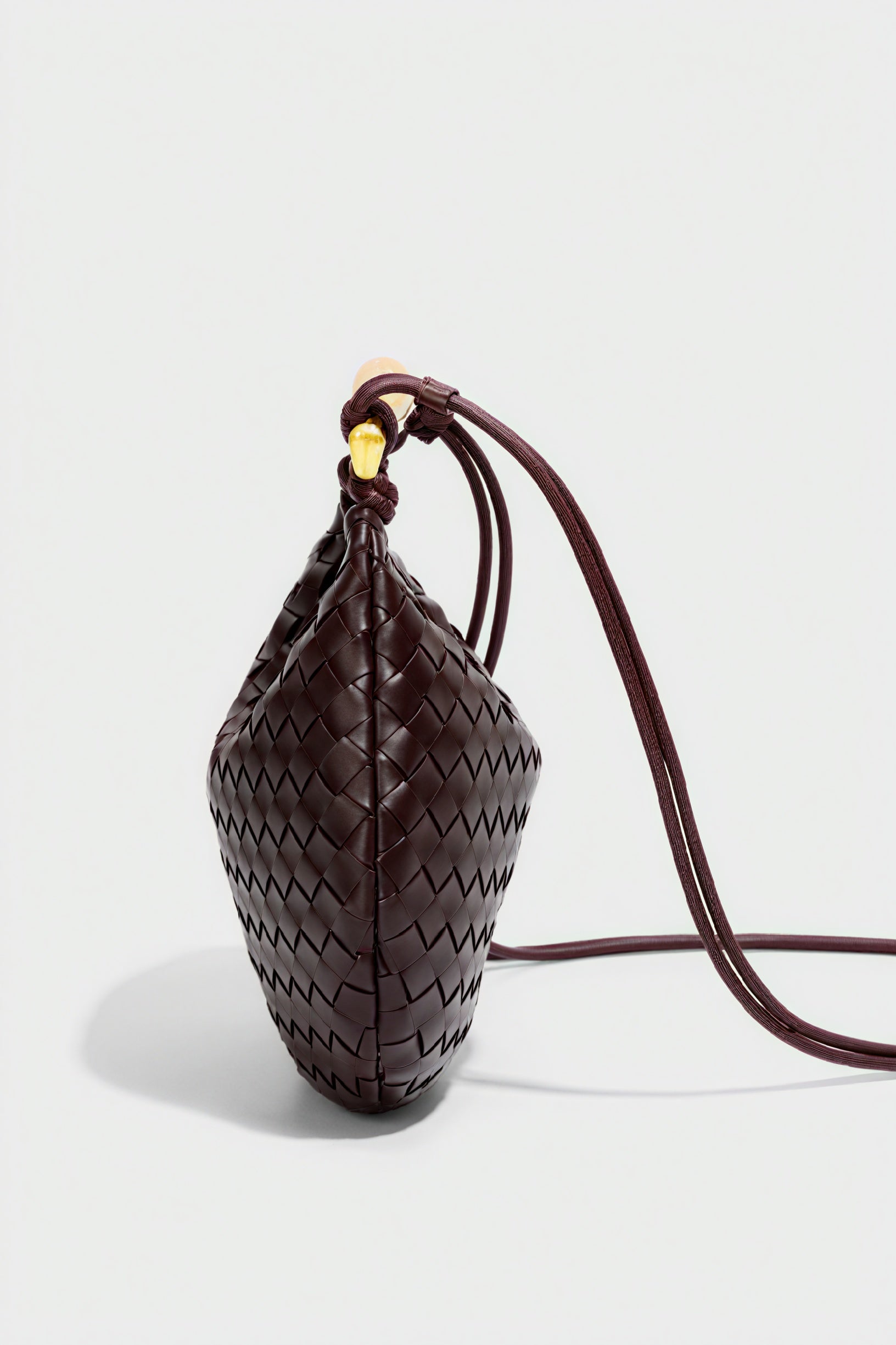 Elegante Halbmond-Tasche mit Webmuster