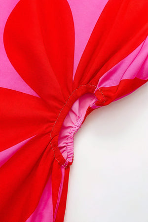 Figurbetontes Kleid mit floralem Design