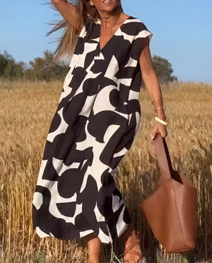 Fließendes Kleid mit abstraktem Muster