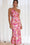 Elegantes Kleid mit floralem Muster und asymmetrischem Schnitt
