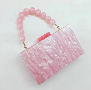 Elegante Clutch mit Perlen-Henkel
